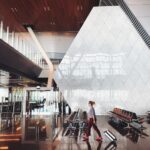 person walking inside aiport